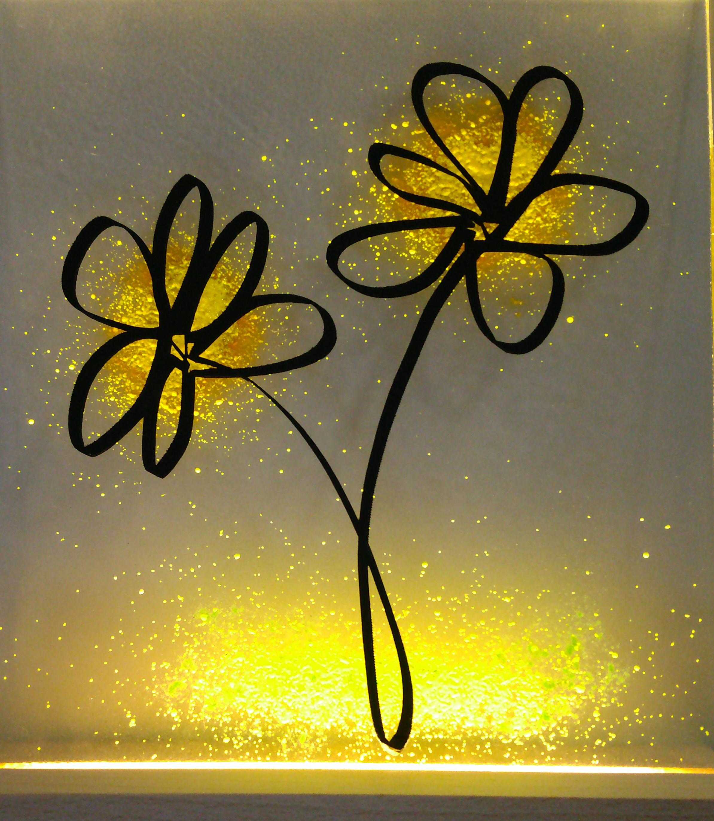 Glas+Licht Glasplatte mit Blumenmotiv von LED beleuchtet